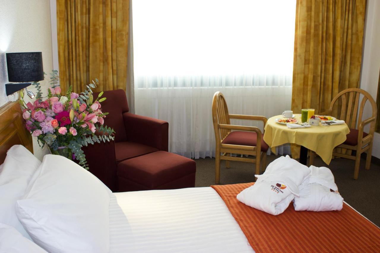 ホテル サン ファン パーク San Juan del Río エクステリア 写真 A room at the hotel